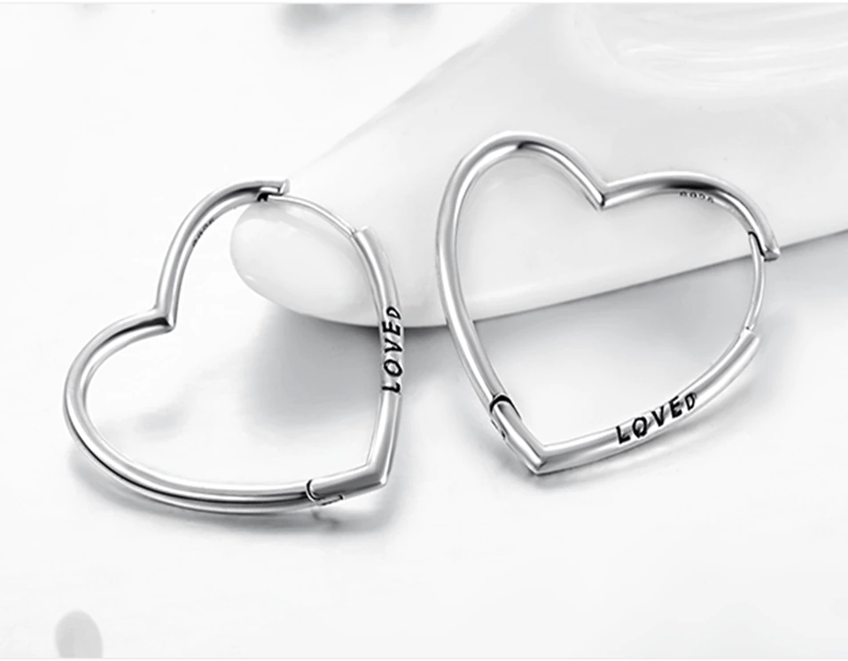 Heart shaped deals hoop earrings silver